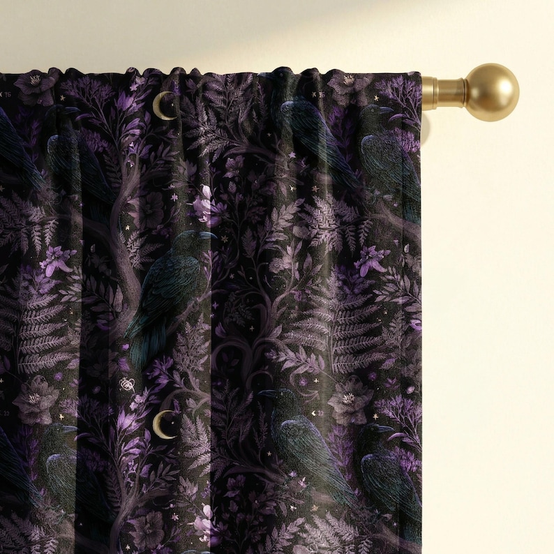 May include: A curtain panel hanging on a gold rod, featuring a dark pattern of black ravens perched among purple flowers, ferns, and foliage. The design includes small crescent moons and stars scattered throughout the deep violet and black background.