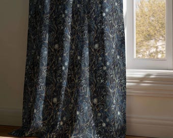 May include: A floor-length curtain featuring a dark navy blue background with a dense, repeating pattern of intertwined branches, leaves, and small round fruit in shades of muted green, brown, and pale gray, hanging vertically by a window.