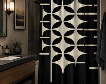 May include: A shower curtain featuring a bold, high-contrast pattern of black and off-white geometric shapes. The design consists of repeating vertical columns of stylized, rounded leaf-like forms and horizontal lines on a solid black background.