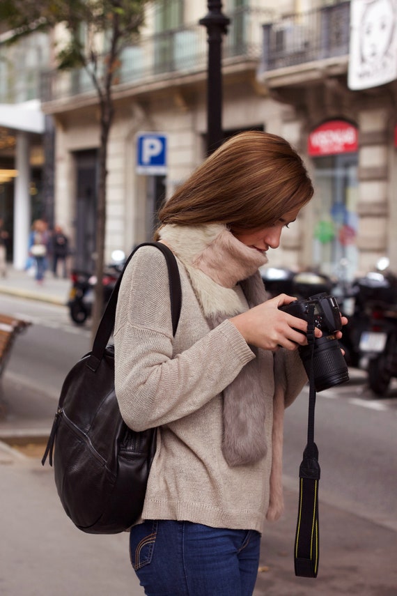 round black leather bag