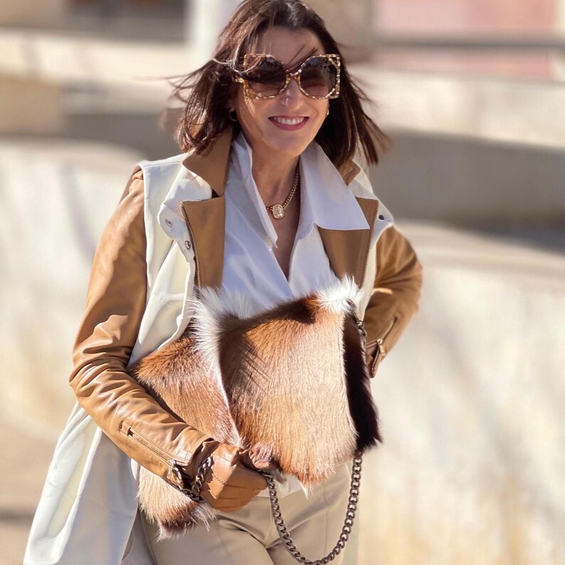 Springbockledertasche, handgefertigte Clutch aus Fellimitat Bild 11