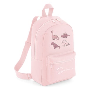 Dinosaure T rex personnalisé et trois autres dinosaures roses pour la rentrée, la crèche, le cartable, l'école de jeu, les dinosaures roses