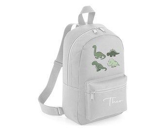 Personalised Dinosaur T rex and three other Dino's Backpack Rucksack Back to school, nursery, school bag, play school Green dinosaurs