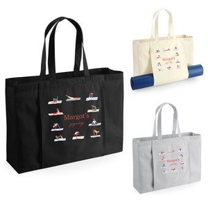 May include: A set of three rectangular tote bags in black, cream, and gray, each featuring two handles and a central graphic of various yoga poses surrounding the red text "Margot's yoga bag". One cream bag holds a rolled blue yoga mat.