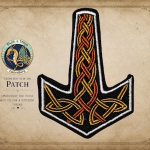May include: An embroidered patch shaped like Mjolnir, featuring intricate gold and copper Celtic knotwork on a black background with a white border. The text reads Myth a Stitch Embroidery, Iron on/Sew on Patch, Embroidery for those who follow a different thread.
