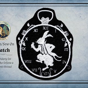 May include: A black and white embroidered iron-on or sew-on patch shaped like a pocket watch. The center features a white rabbit silhouette, surrounded by Roman numerals from I to XII. The text reads Myth & Stitch Embroidery, Iron on/Sew On Patch.