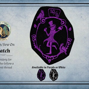 May include: An iron-on or sew-on patch featuring a purple embroidered silhouette of a character in a top hat holding a cup, framed by an oval border with birds and the text 10/6. The design is shown in purple and white variations on a blue background.