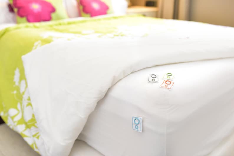 Simple to attach snap on labels that tell you the size of sheets and other bed linens for easy bed making. image 4