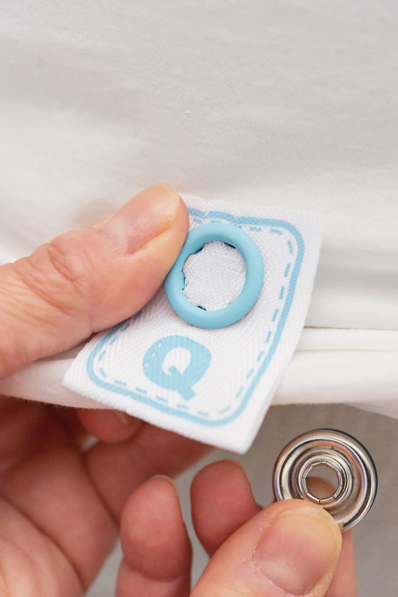 Simple to attach snap on labels that tell you the size of sheets and other bed linens for easy bed making. image 3