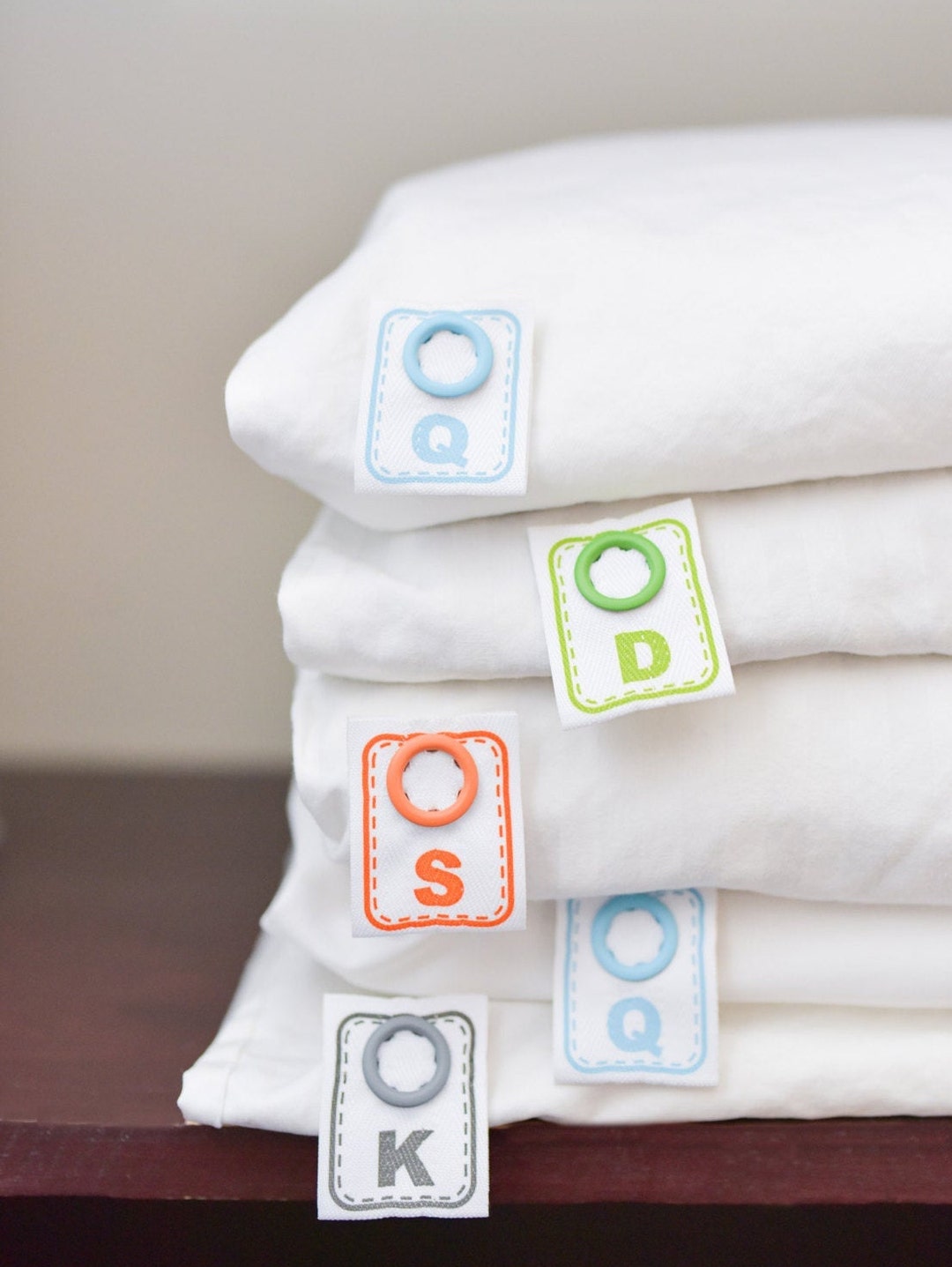 Simple to Attach Snap on Labels That Tell You the Size of Sheets and Other Bed Linens for Easy