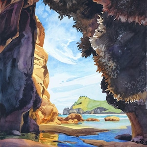 May include: Watercolor painting of a coastal scene viewed from a cave opening. The artwork features a sandy beach, blue water, and a green hill in the distance. The cave walls are dark and textured, with sunlight illuminating the scene.