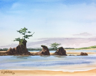 May include: A watercolor painting depicting a coastal scene with dark brown rock formations rising from light blue water. Two small green trees grow atop the rocks. The sky is a pale blue with soft clouds, and the artist signature EJ Miller 16 is visible.