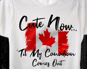 Ladies Canada T-shirt "Cute Now... 'Til My Canadian Comes Out" Womens White Crew Neck Short Sleeve Shirt Top S-XXL Ottawa Montreal Toronto