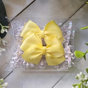 Yellow polyester dog bow with non latex groomer bands, pair of dog bows, yellow dog hair bow, gummiband, small bow for dog