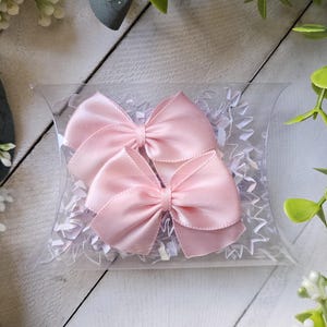 light pink polyester dog bow with non latex groomer bands, pair of dog bows, pink dog hair bow, gummiband, small bow for dog,