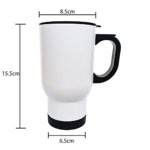 May include: A white travel mug with a black handle, lid, and base. The mug is 6.1 inches tall, 3.3 inches wide, and 2.6 inches in diameter at the base. The mug is designed to keep beverages hot or cold while traveling.