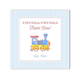 May include: Blue and yellow toy train with red wheels and a red chimney. The train is on a blue and white striped background. The text "Chugga Chugga Thank Choo! Love, Ethan" is printed on the card.