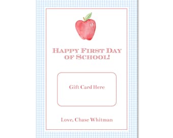 May include: A rectangular gift card with a light blue gingham border and a red border. The card features a watercolor apple and the text "HAPPY FIRST DAY OF SCHOOL!" with a space for a gift card and the name "Chase Whitman".