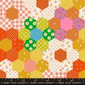 May include: A colorful fabric pattern featuring a patchwork of hexagonal shapes in various colors and patterns. The design includes orange, yellow, pink, green, and cream-colored hexagons with polka dots, floral, and checkered designs. The text "RUBY STAR SOCIETY" is at the bottom.