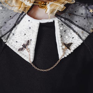 black dress with gold chains designer Black Gold Chain Straps Drawstring Cut Out Mini Dress