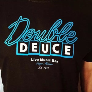 Novelty adults film t-shirts in the style of Road house