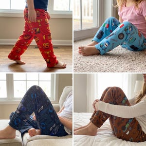 May include: Four pairs of lounge pants featuring various character prints. One pair is red with race car graphics, one is light blue with automotive icons, one is black with blue circuit patterns, and one is brown with cartoon vehicle motifs.