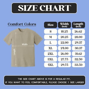 May include: A beige t-shirt size chart featuring a Comfort Colors graphic. The chart displays width and length measurements in inches for sizes S through 4XL. A diagram shows how to measure the shirt, and text advises choosing a larger size.
