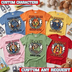 May include: Six short-sleeved t-shirts in blue, orange, yellow, pink, green, and red, each featuring a circular graphic with a Zootopia character, a checkered border, lightning bolts, and the text "SINCE 2016" along with the character's name.