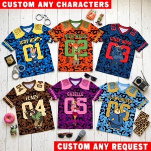 May include: Six short-sleeved jerseys featuring Zootopia characters Judy Hopps, Nick Wilde, Chief Bogo, Flash, Gazelle, and Clawhauser. Each jersey displays a character, name, and number on a camouflage background. Text reads CUSTOM ANY CHARACTERS.