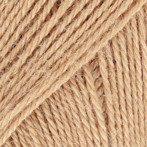 Alpaca by DROPS, a wonderful yarn made from 100% pure Alpaca superfine. The fiber is untreated camel