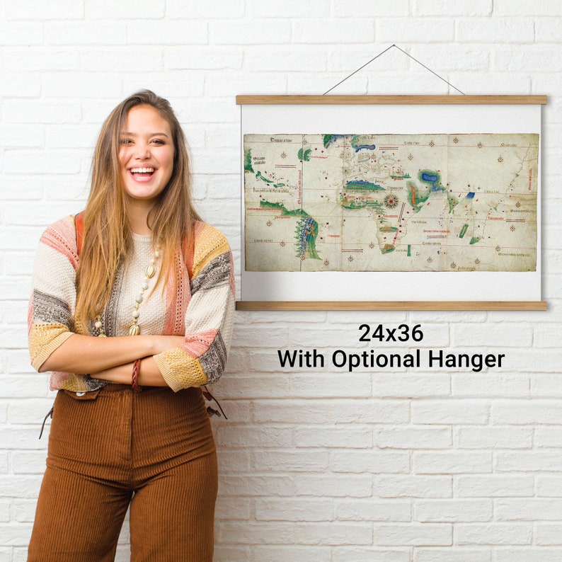 May include: A vintage world map print in a wooden frame with a hanger. The map is in shades of green, blue, and brown. The print is 24 inches by 36 inches.
