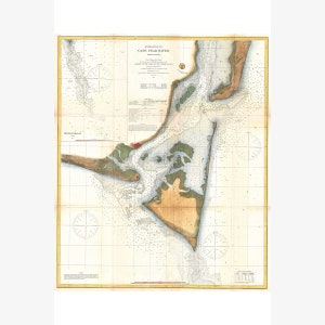 May include: An antique nautical chart of the entrance to Cape Fear River, North Carolina. The chart is printed on paper and features a detailed map of the river and surrounding area. The chart is dated 1858 and includes a compass rose and depth soundings.