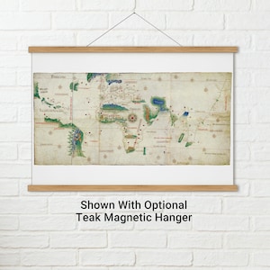 May include: A vintage world map print with a faded, antique look. The map is drawn in a style reminiscent of early cartography, with handwritten text and colorful markings. The map is framed and ready to hang.