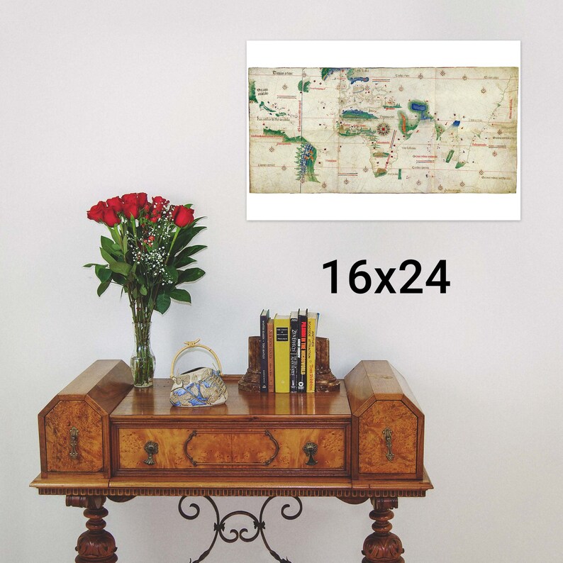 May include: A vintage map print of the world, framed in a white frame, with the text "16x24" printed below the frame.
