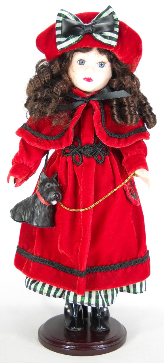 limited collection genuine porcelain doll and matching miniature ornament