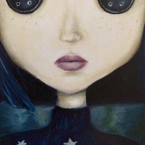 May include: A painting of a girl with large black button eyes and a dark blue turtleneck sweater with white stars. Her lips are painted a dark pink.