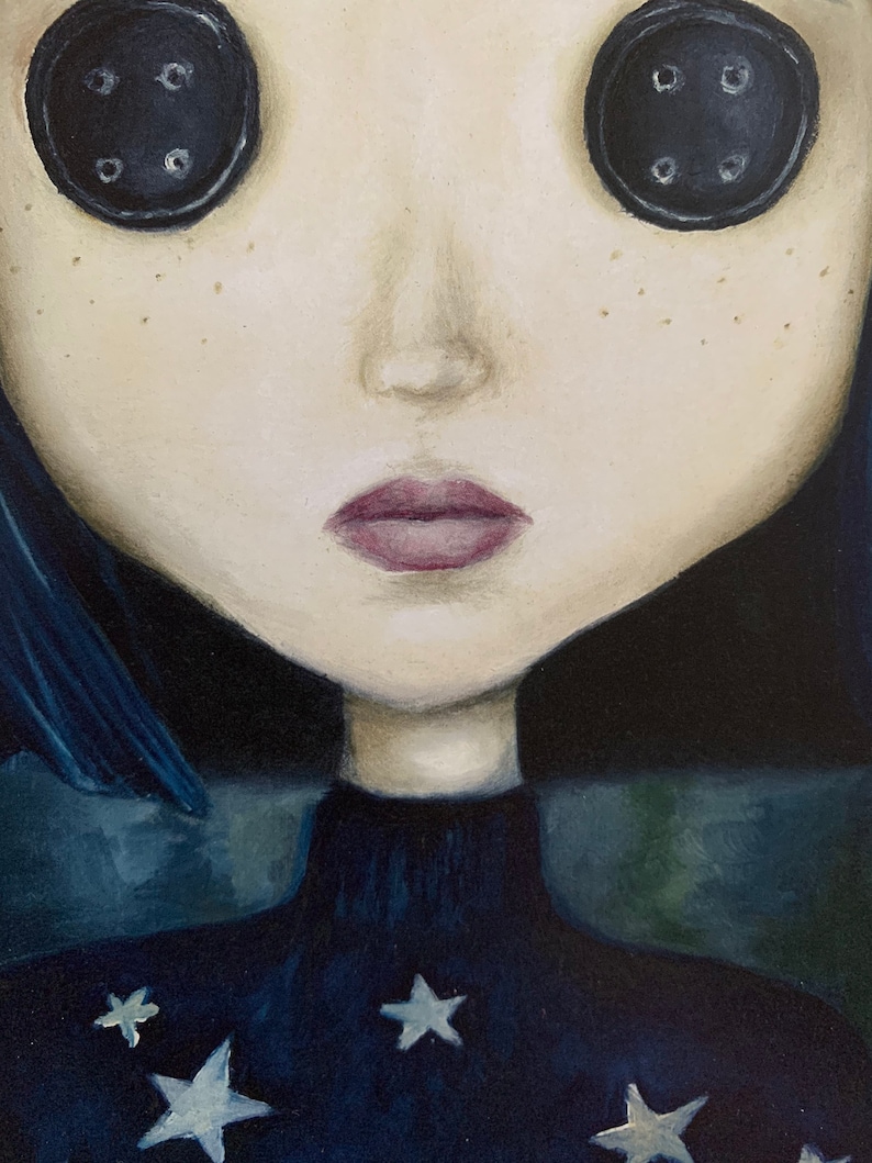 May include: A painting of a girl with large black button eyes and a dark blue turtleneck sweater with white stars. Her lips are painted a dark pink.