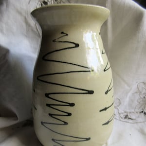 white and black studio pottery vase, black zigzag design on cream, expanded lip, funky and functional, great condition