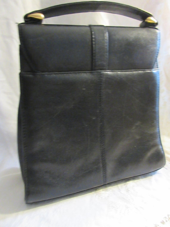 black leather handbag, top handle, brass closure,… - image 2