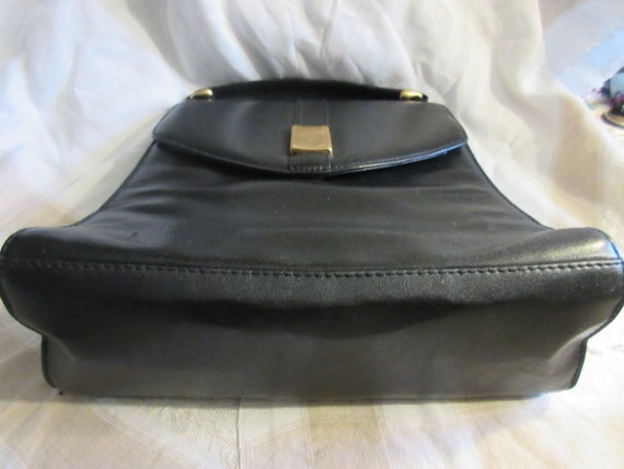 black leather handbag, top handle, brass closure,… - image 4
