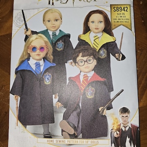 May include: Simplicity sewing pattern for 18" dolls featuring Harry Potter characters. The pattern includes images of dolls dressed in Hogwarts uniforms, with the text "Harry Potter" at the top. The pattern number is S8942.