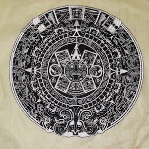 May include: Black and white embroidered patch of the Aztec calendar, also known as the Sun Stone. The patch is circular and features intricate details of the calendar's symbols and glyphs.