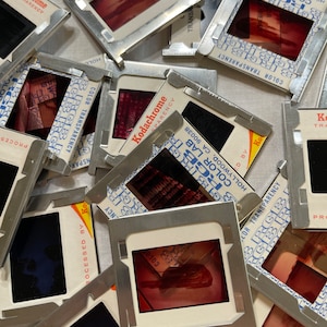 10 vintage slides with metal frames