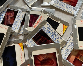 10 vintage slides with metal frames