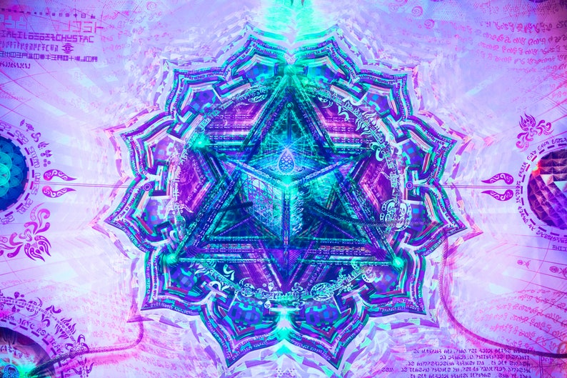 May include: A colorful abstract mandala with a geometric design in shades of purple, blue, and green. The mandala is surrounded by a white background with faint lines and text.