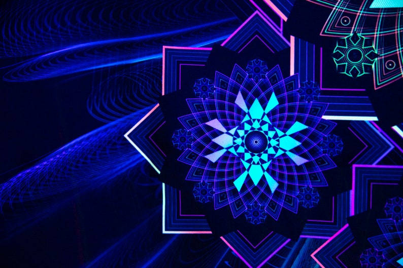 May include: Abstract digital art featuring geometric shapes in shades of blue, teal, and purple. The design includes symmetrical floral patterns and angular elements, creating a vibrant and modern aesthetic. The background is a deep navy blue.