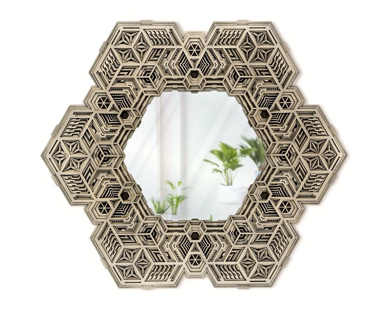May include: A hexagonal mirror with a geometric, intricate wooden frame. The frame is made of multiple layers of wood, creating a 3D effect. The mirror is reflecting a room with plants.