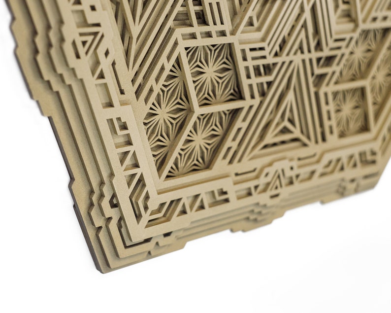 May include: A layered wooden wall art piece with a geometric design. The design features intricate patterns and shapes, creating a visually interesting and textured surface.