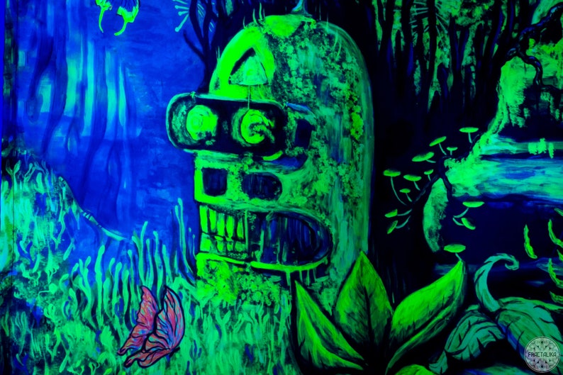 May include: A green and blue abstract painting with a robot-like figure in the center. The figure has a large head with a skull-like face and a pair of goggles. The background is a dark blue with green and white accents.