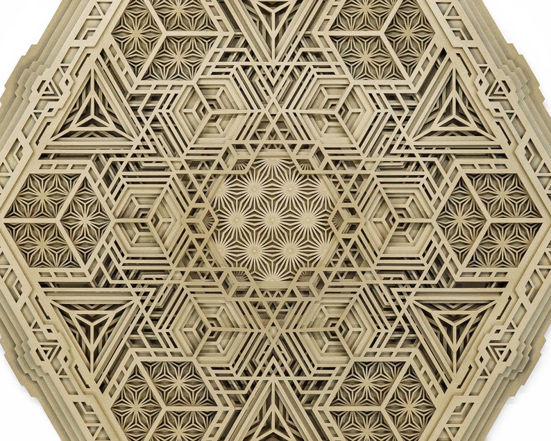 May include: A geometric design made of layered wood with a hexagonal shape and intricate patterns.